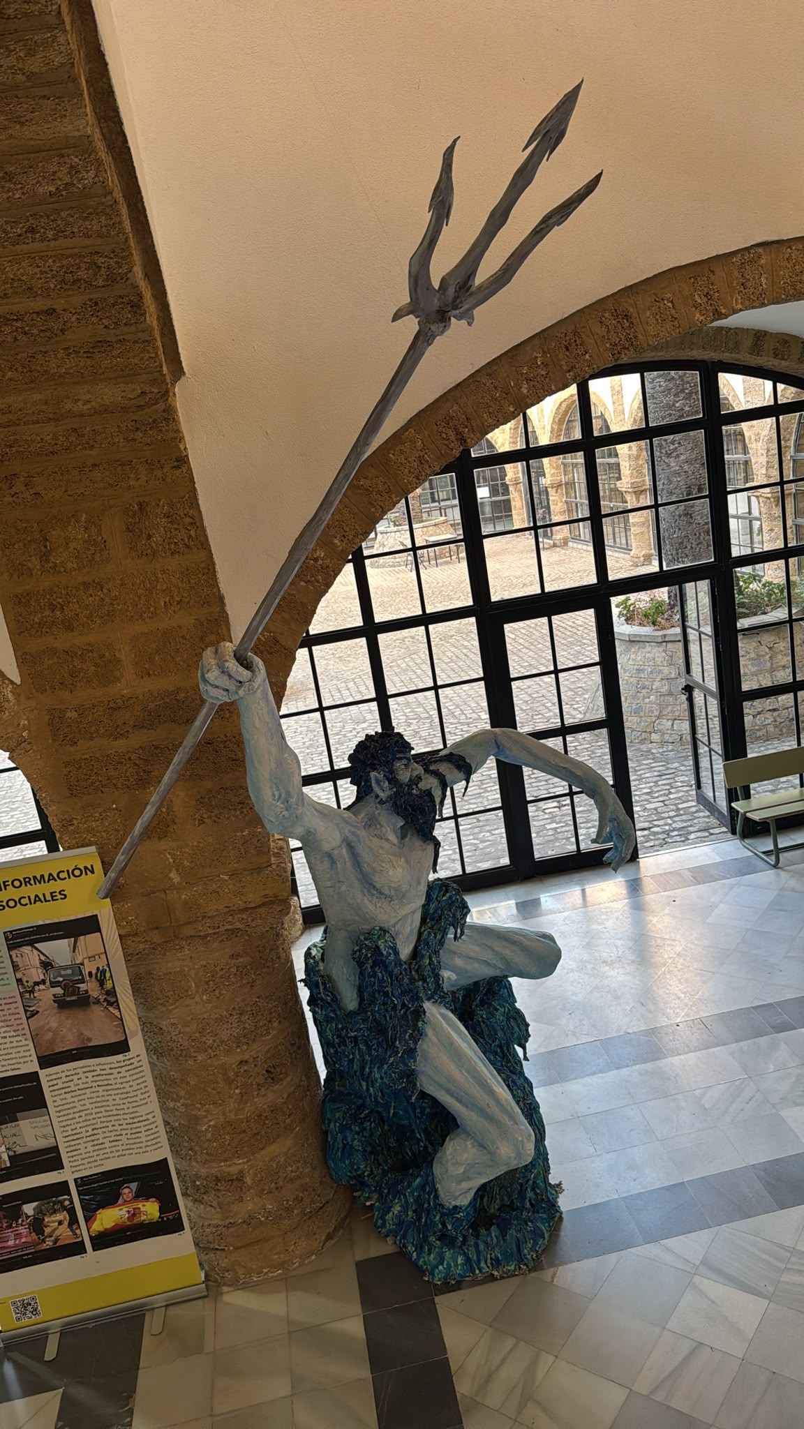 A sculpture of Neptune with his trident, on display in a courtyard of the conference venue in Cádiz