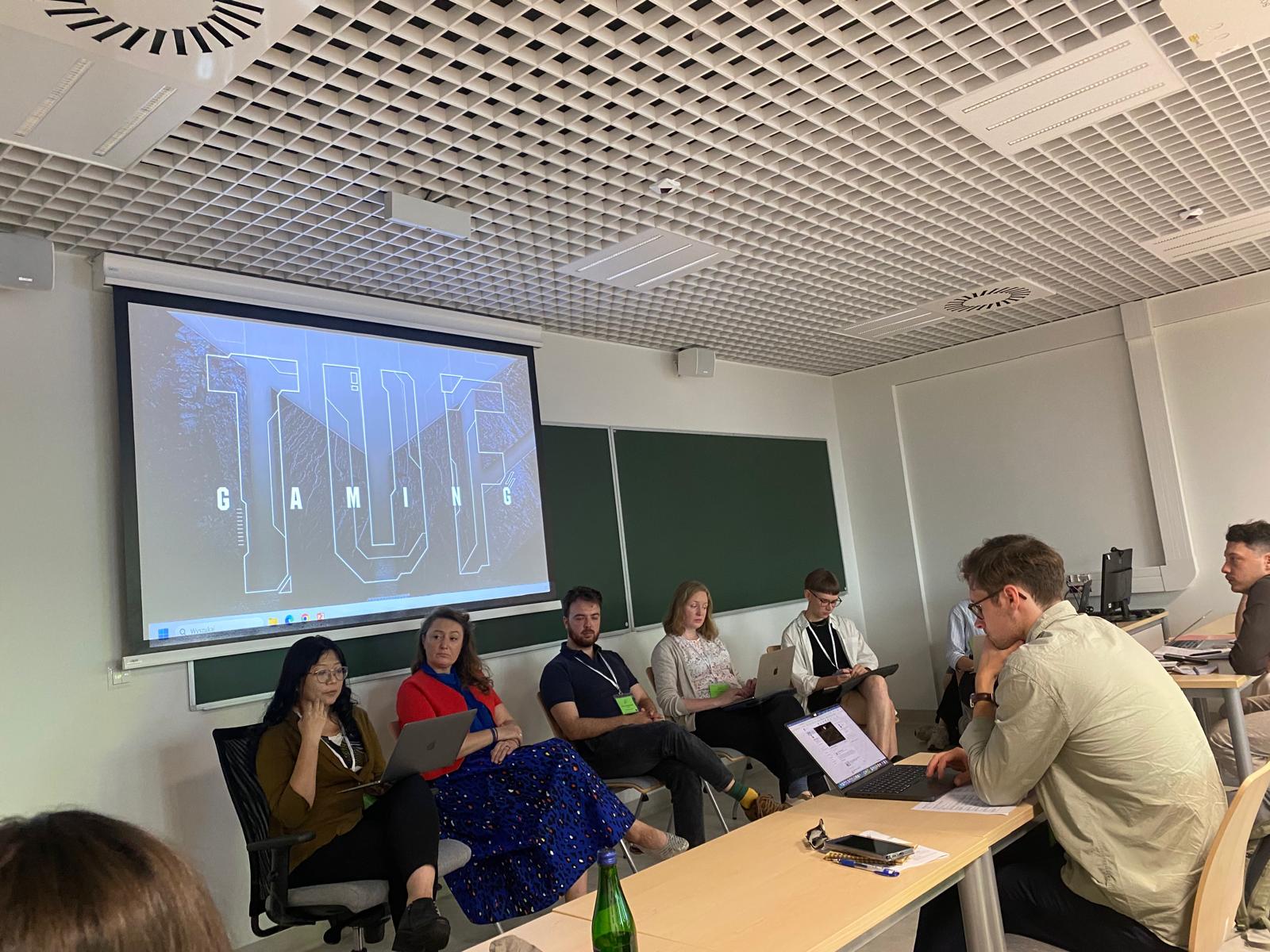 Wide view of the Democracy on the Edge panel room at EASST 2026, with panellists and audience