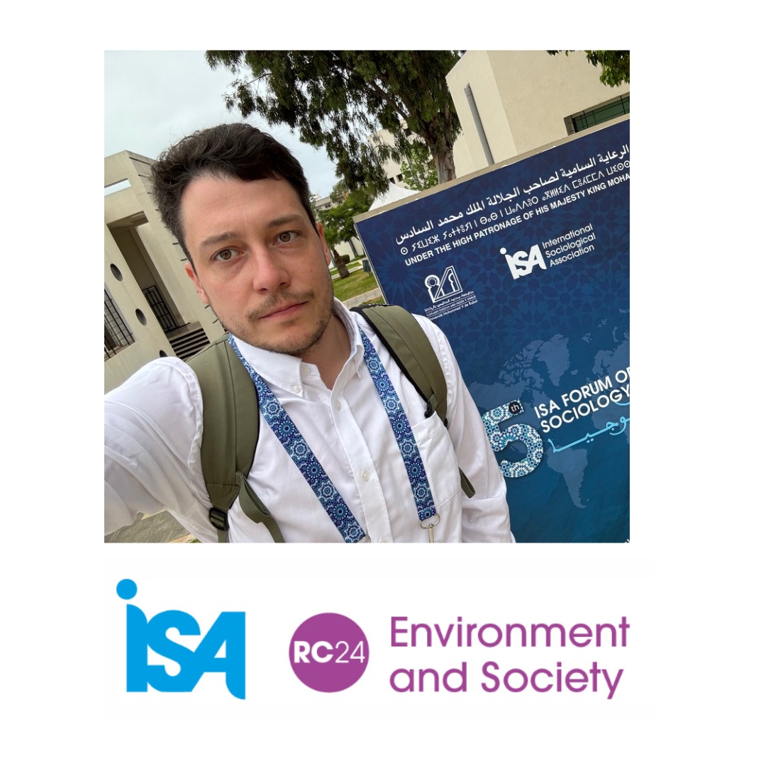 Tadeusz Rudek at the ISA Forum of Sociology, next to the RC24 Environment and Society logo